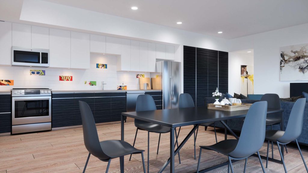 kitchen area with steel appliances, wood-style flooring, kitchen table, and couch with tv in living room area